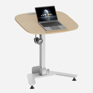 White oak WalkingPad ETD5 standing desk raised to standing height