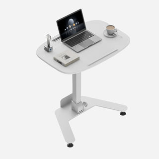 White WalkingPad ETD5 standing desk set up with a laptop and a cup