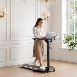 Woman walking on a treadmill while working at the WalkingPad ETD5 standing desk