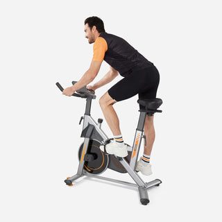 Man riding the WalkingPad MRB2 exercise bike