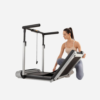 Woman unfolding the WalkingPad MX3 treadmill on the floor