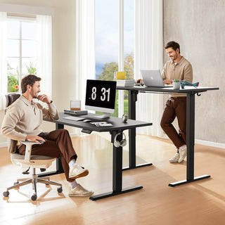 Two WalkingPad electric standing desks at different heights in one room