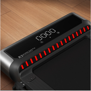 Close view of the lit LED display and light bar on the WalkingPad R3 Hybrid