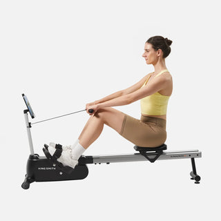Woman rowing on the WalkingPad RW001, seen from the side