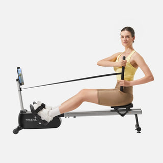 Woman rowing on the WalkingPad RW001 with a tablet on the holder