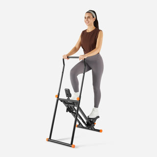 Woman climbing on the WalkingPad SC1 stair stepper