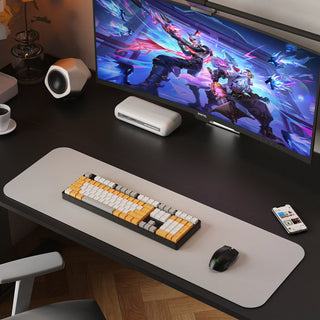 WalkingPad two-piece standing desk used as a gaming setup with a wide monitor