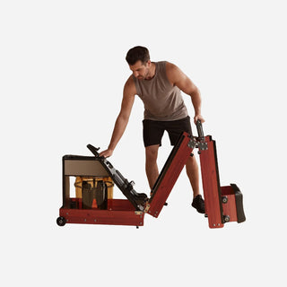 Man folding the WalkingPad WM10 water rowing machine upright
