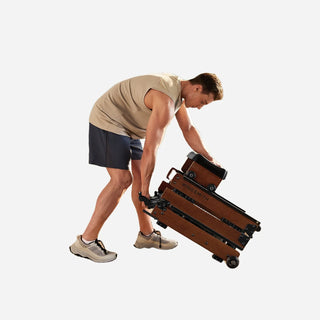 Man folding the WalkingPad WR3L water rowing machine with one hand