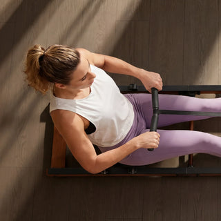 Close view of a woman pulling the handle on the WalkingPad WR3L