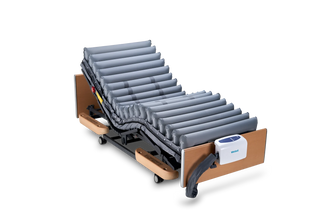 Wellell PD02501 Domus 4 digital pressure redistribution mattress with quilted cover, low air loss therapy, and seat inflate mode.
