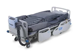 Wellell PD07702 Optima Turn System automated lateral rotation mattress with alternating pressure therapy and stretch cover.
