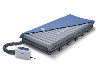 Wellell Procare Elite low air loss pressure redistribution mattress system with heel relief function and quilted cover.
