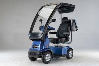 Afikim FTC4660 Afiscooter C4 mobility scooter in blue with weather protection canopy, orthopedic rotating seat, and outdoor mobility design.