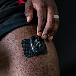 iReliev WiTENS Mini wireless TENS unit being used for everyday pain relief