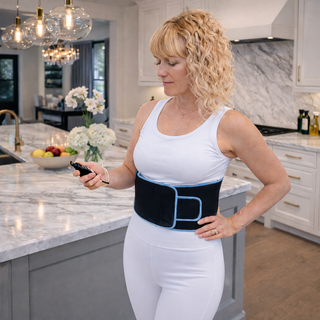 iReliev RL-507-BLUE back wrap worn on lower back during red light therapy